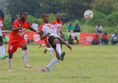 Allan Lukonzo of Goseta boys (L) fights for the ball with Seranis Sufii Mohammed in the the Copa Coca cola under boys 16 National Finals Tournament 2019 at Kisumu National Polytechnic Kisumu.